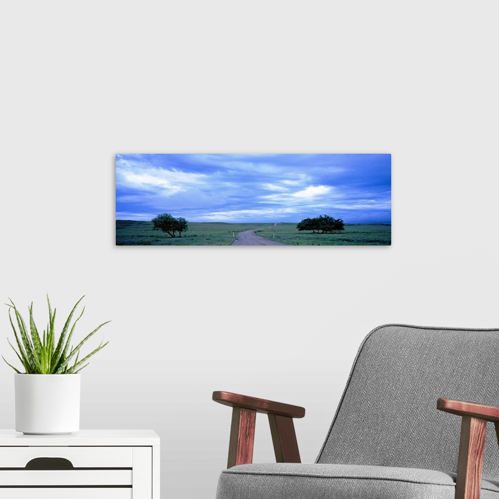 A modern room featuring Country road passing through a landscape, Kansas