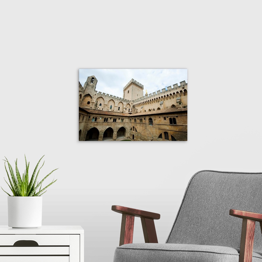 A modern room featuring Courtyard of a palace, Palais des Papes, Avignon, France