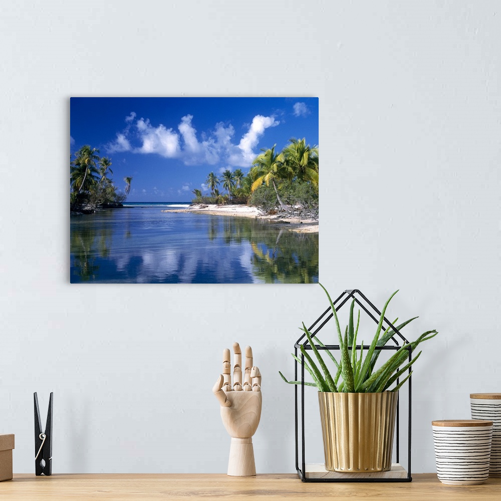 A bohemian room featuring Photograph of lagoon on a cloudy day with beaches on both sides.  The sandy beaches are covered i...