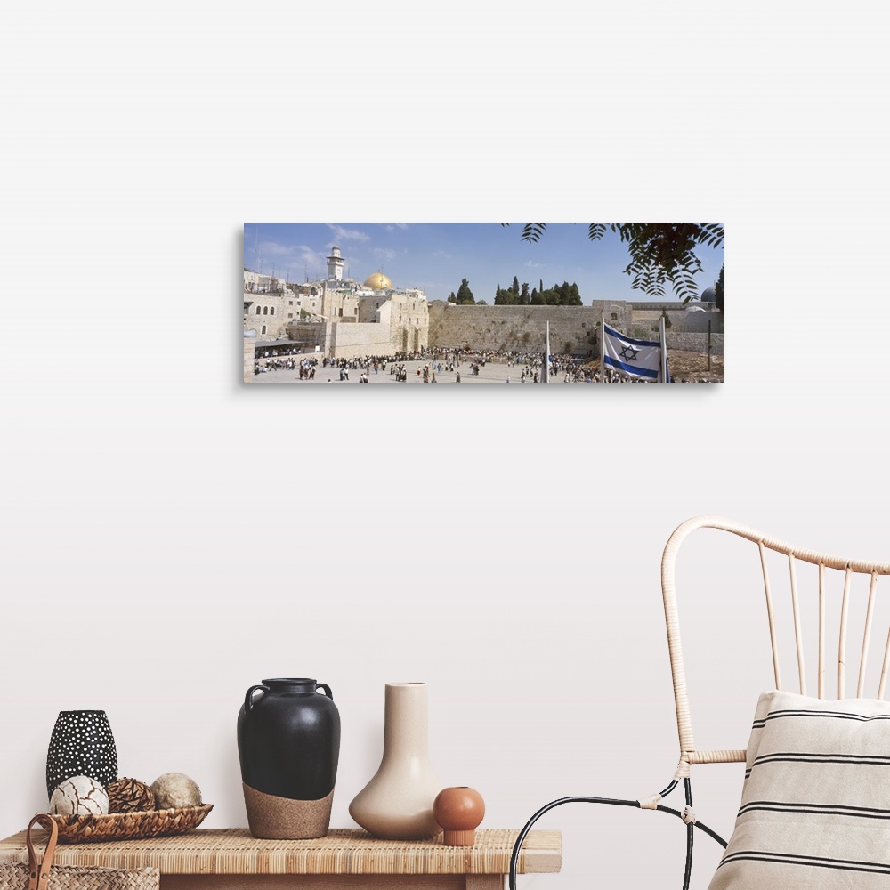 A farmhouse room featuring Wide angle photograph of a crowd of people surrounding the Wailing Wall in Jerusalem, Israel, the...