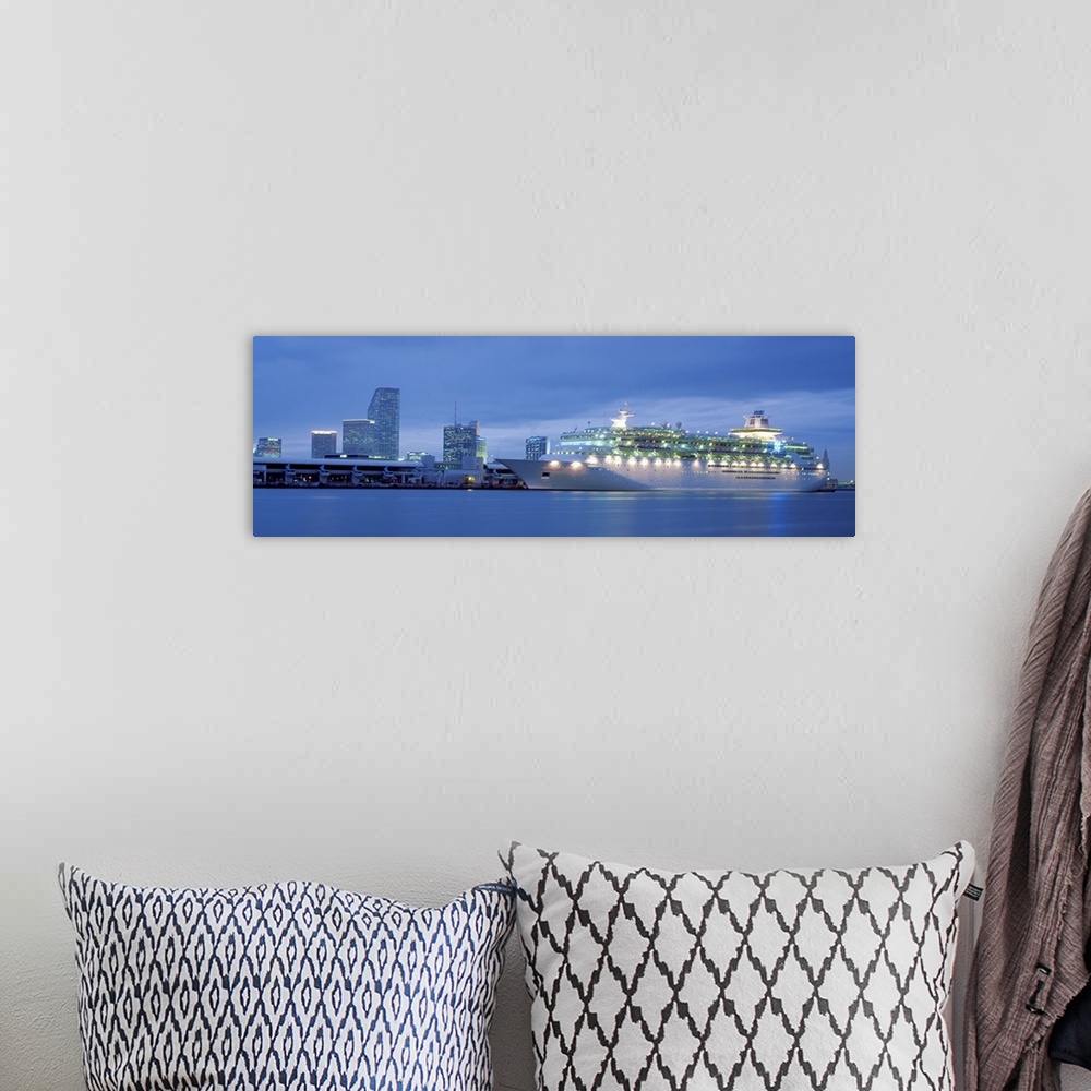 A bohemian room featuring Panoramic of Miami Port featuring a cruiseship and downtown buildings.