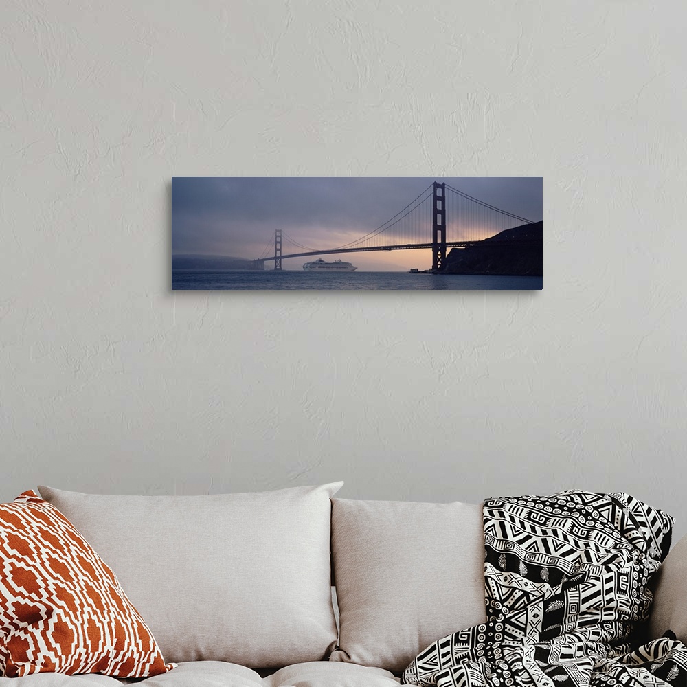 A bohemian room featuring Cruise ship under a bridge, Golden Gate Bridge, San Francisco, California