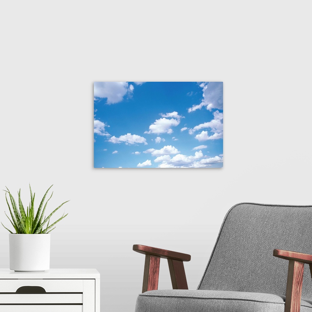 A modern room featuring Cumulus Clouds II