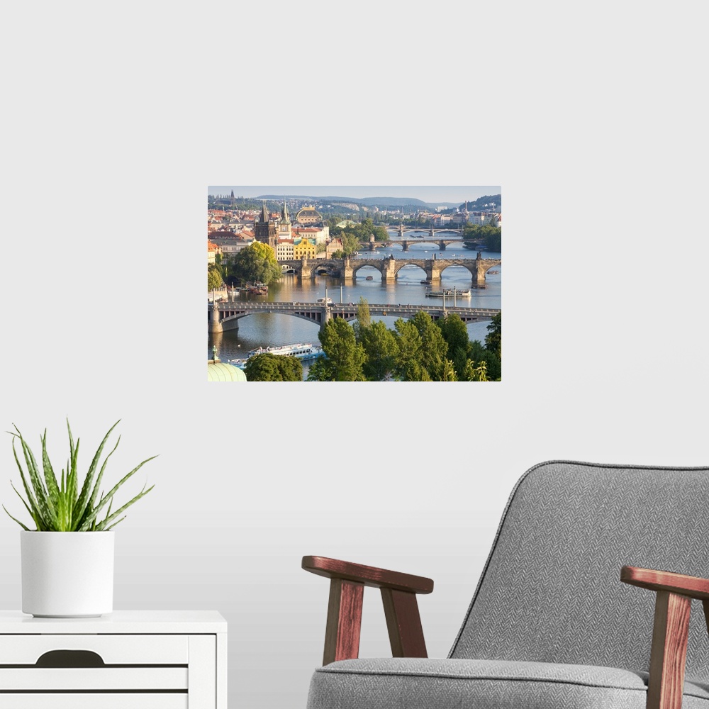 A modern room featuring Czech Republic, Prague, Bridges over Vltava River and Boat Traffic.