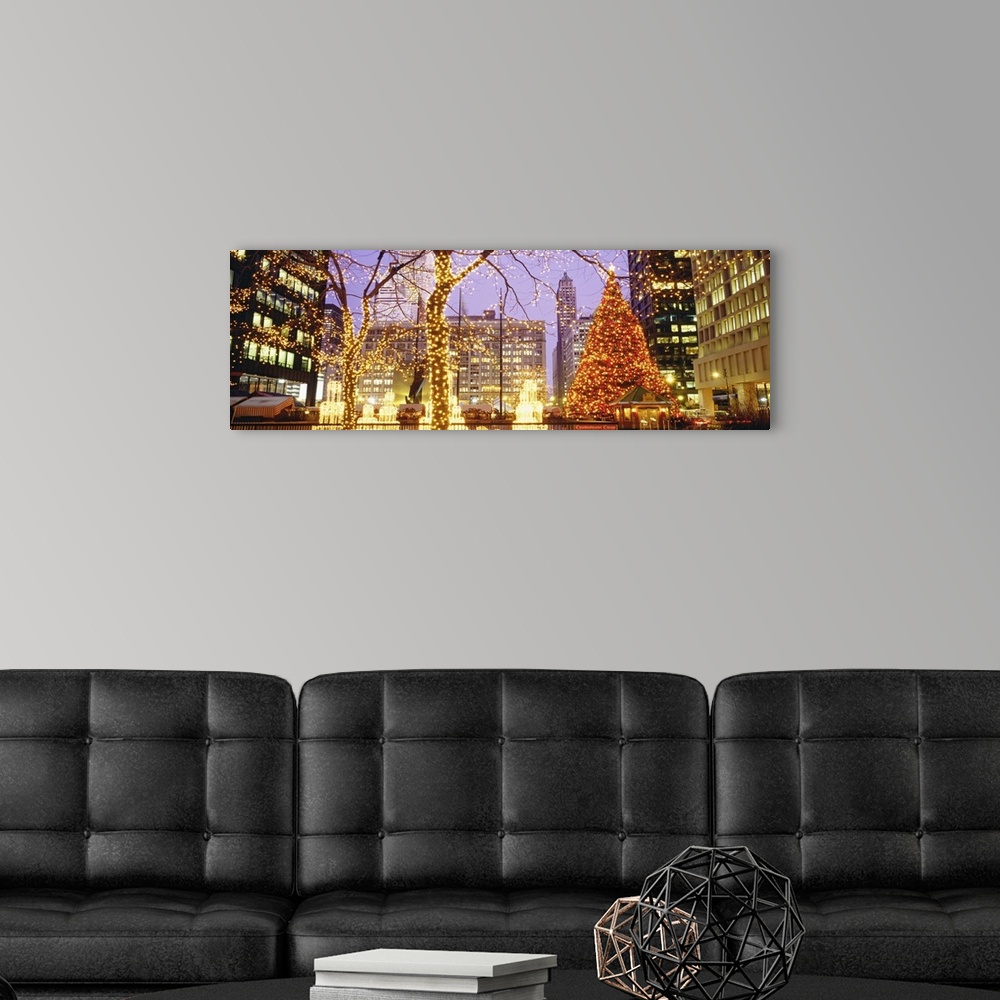 A modern room featuring Panoramic photograph of Daley Plaza decked out with Christmas lights in the trees and a large Chr...