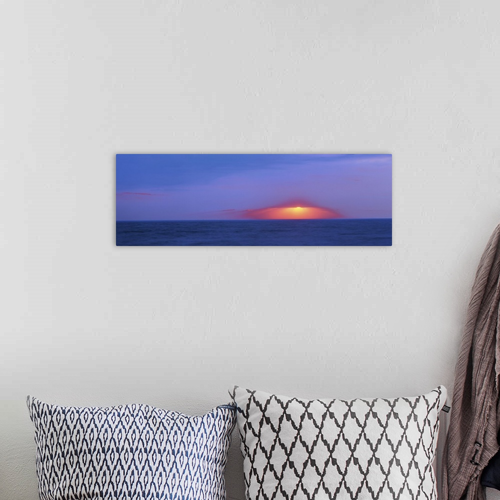 A bohemian room featuring Dark sunset over Cape May