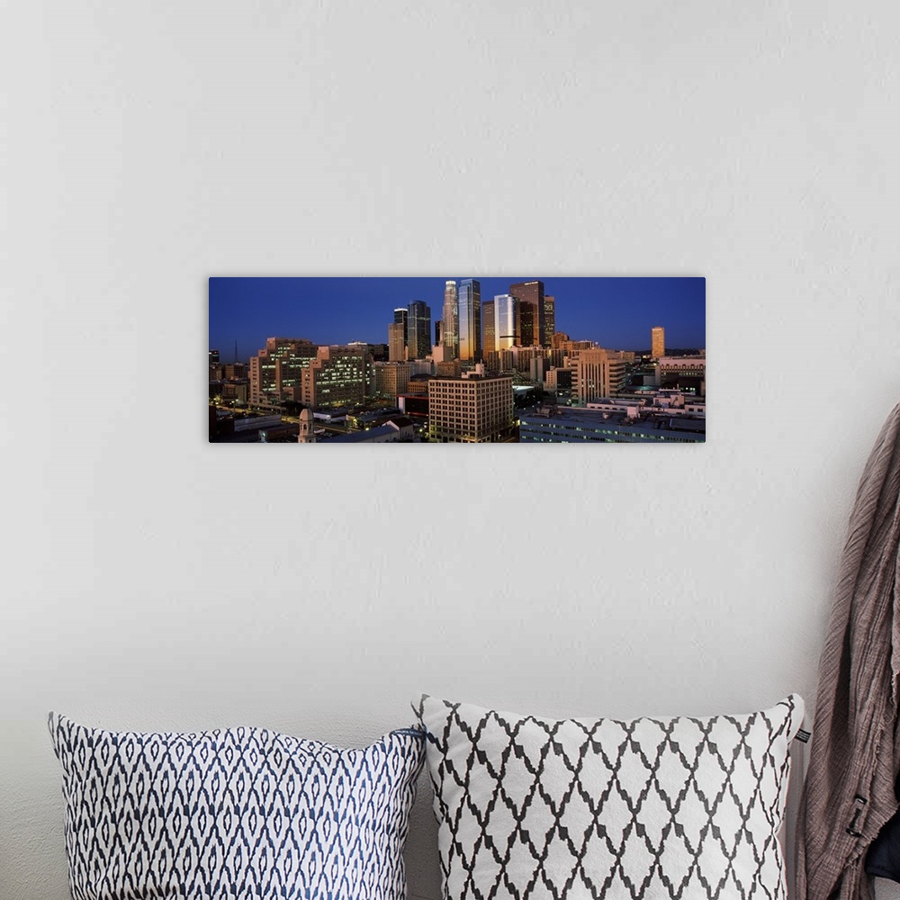 A bohemian room featuring Panoramic photo on canvas of the Los Angeles skyline.