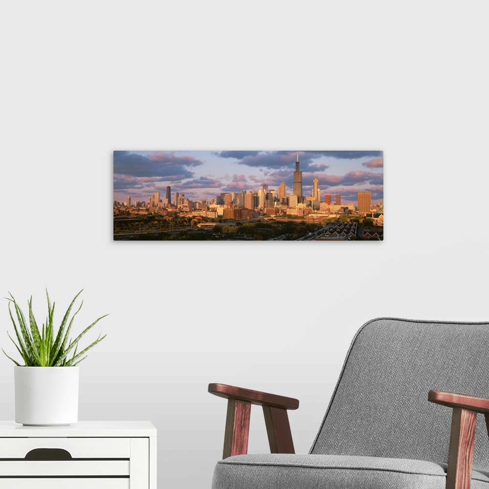 A modern room featuring Panoramic photograph of the Chicago Skyline as sunset in Chicago, Illinois.