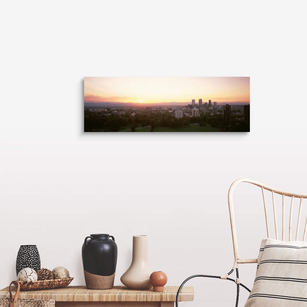 A farmhouse room featuring Panoramic photograph of the sunrise above the Denver, Colorado skyline and park.