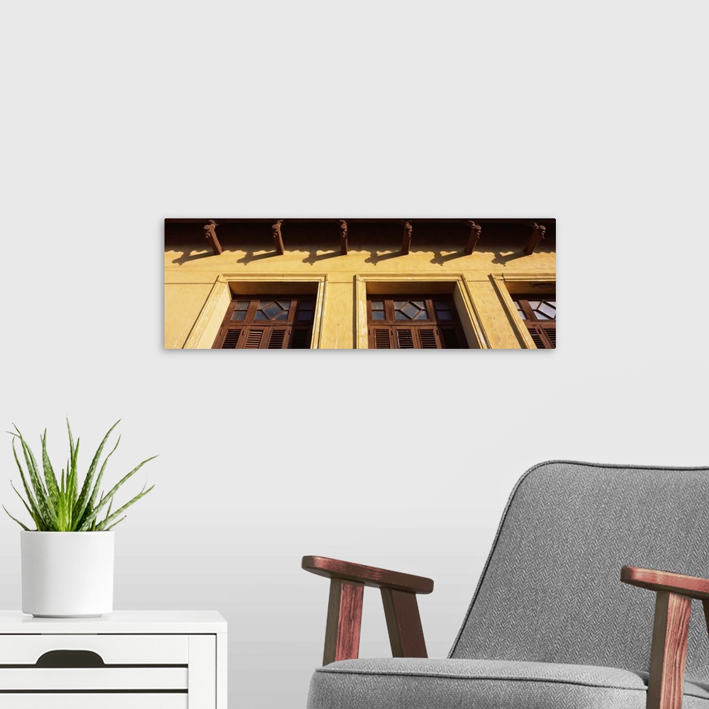 A modern room featuring Detail of wooden shutters Trinidad Cuba