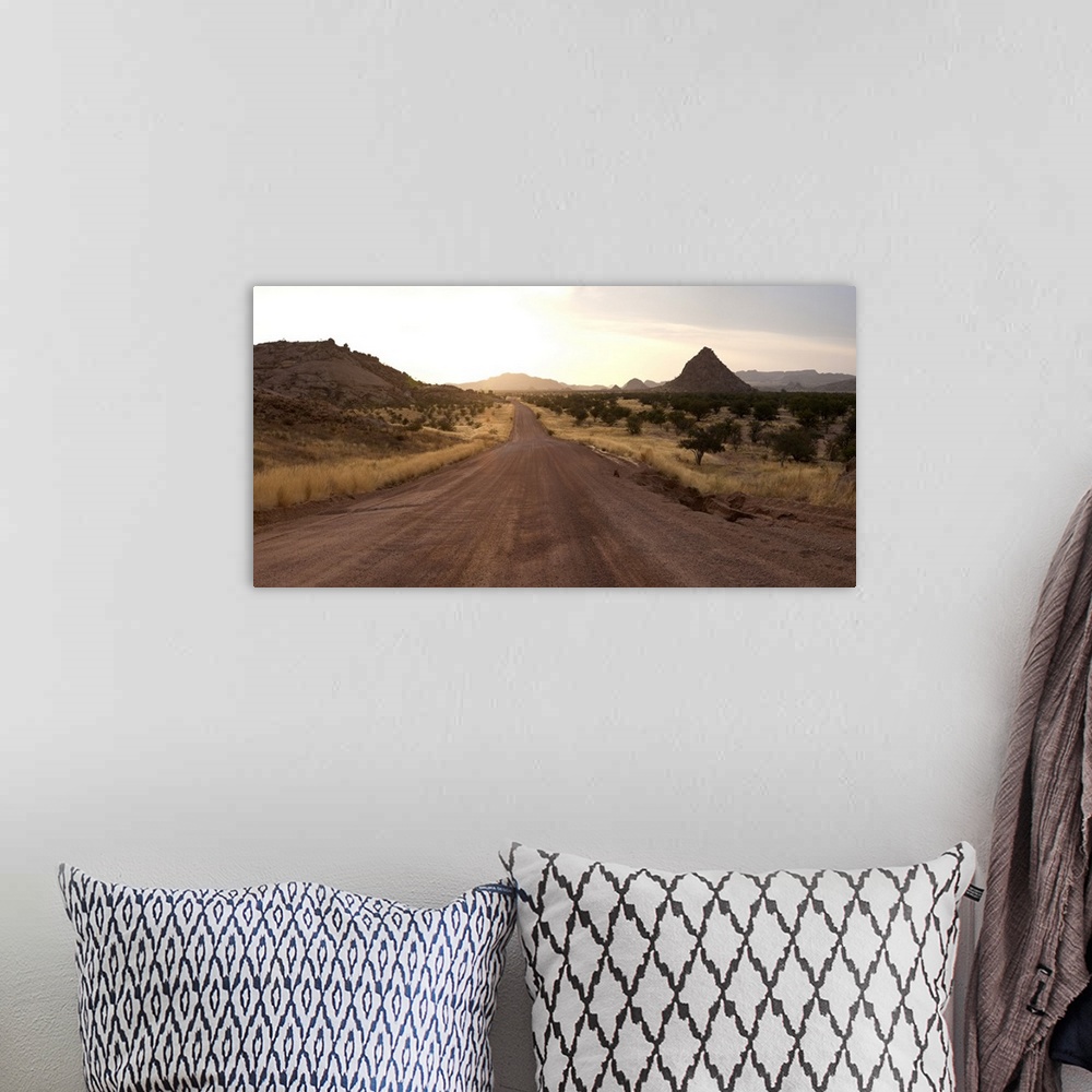 A bohemian room featuring Dirt road passing through a desert, Namibia