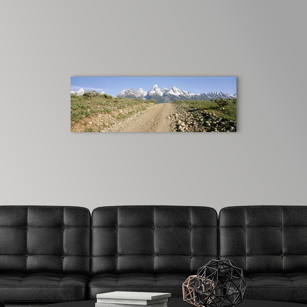 A modern room featuring Dirt road passing through a landscape, Grand Teton National Park, Wyoming