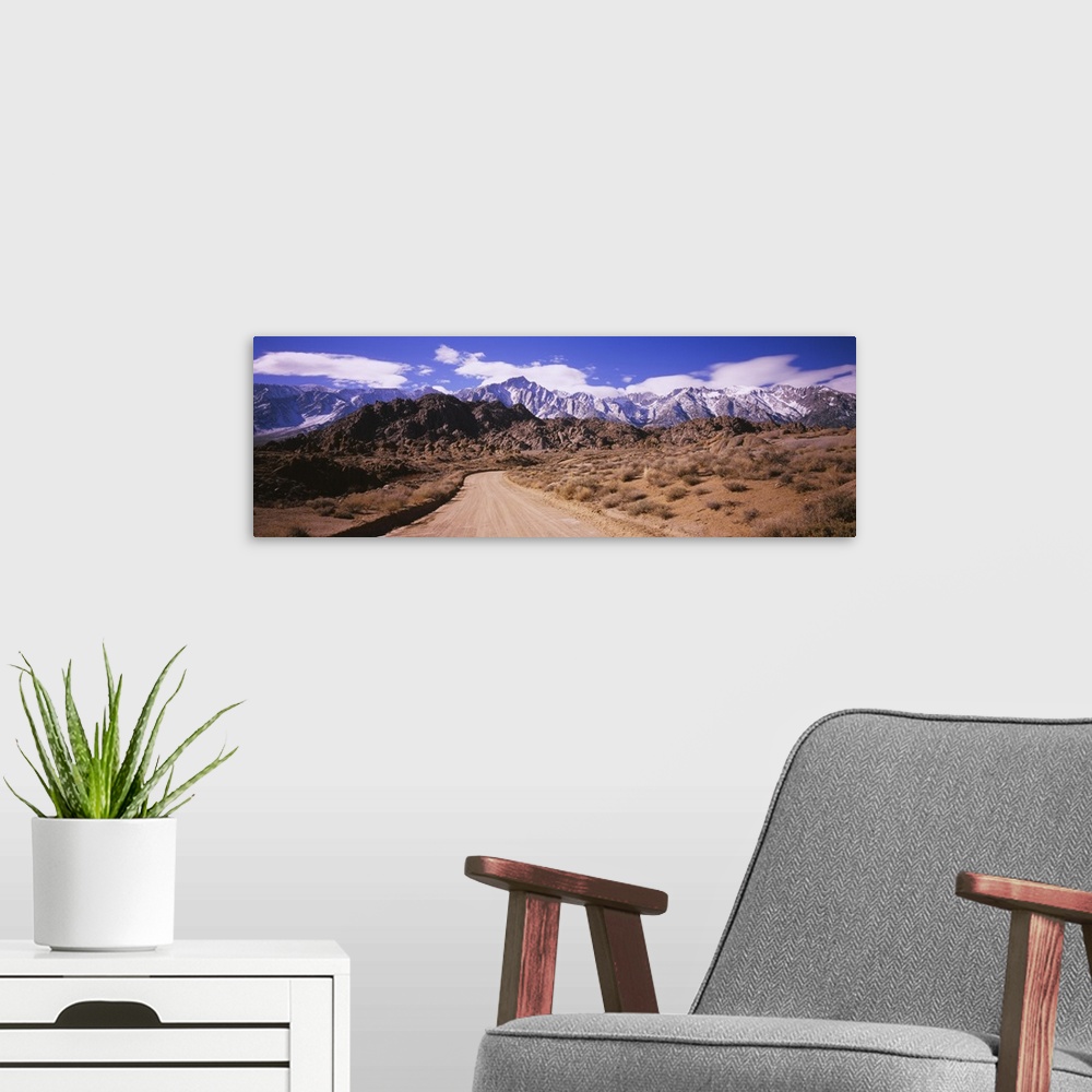 A modern room featuring Dirt road passing through an arid landscape, Lone Pine, Californian Sierra Nevada, California