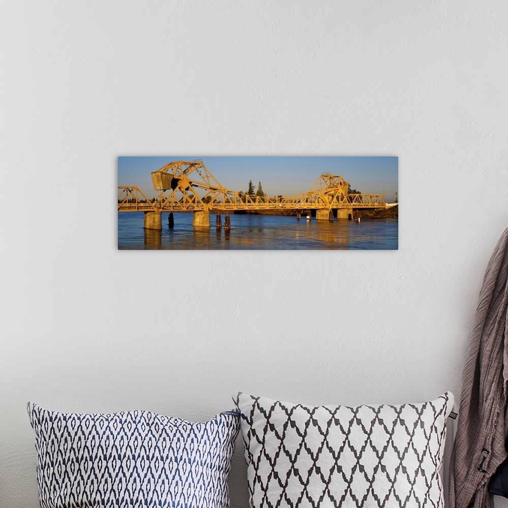 A bohemian room featuring Drawbridge across a river, The Sacramento San Joaquin River Delta, California,