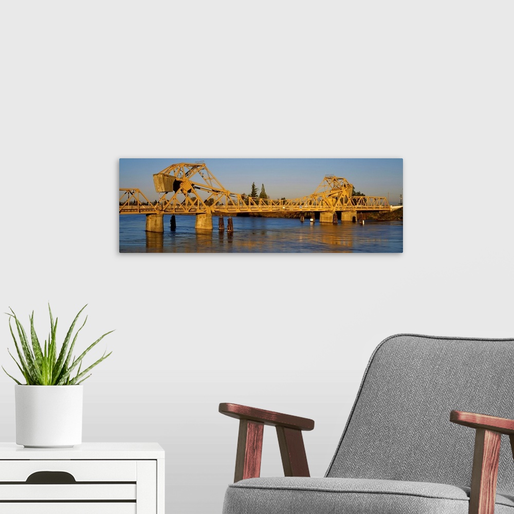 A modern room featuring Drawbridge across a river, The Sacramento San Joaquin River Delta, California,