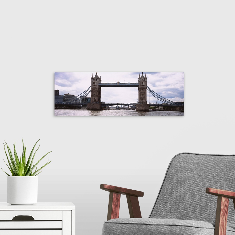 A modern room featuring Drawbridge across a river, Tower Bridge, Thames River, London, England