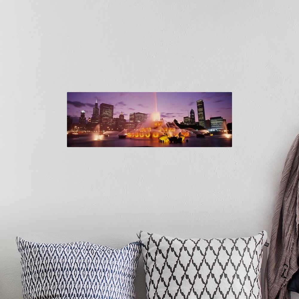 A bohemian room featuring Panoramic photograph taken of Buckingham Fountain lit up at dusk as it sprays water in an intrica...
