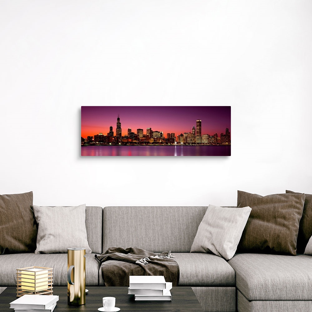 A traditional room featuring Panoramic photograph of the busy skyline taken at dusk in Chicago, Illinois.  The bright lights c...