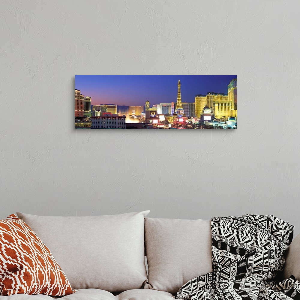 A bohemian room featuring Panoramic photograph showcasing the bright neon lights of the busy strip in Las Vegas, Nevada at ...