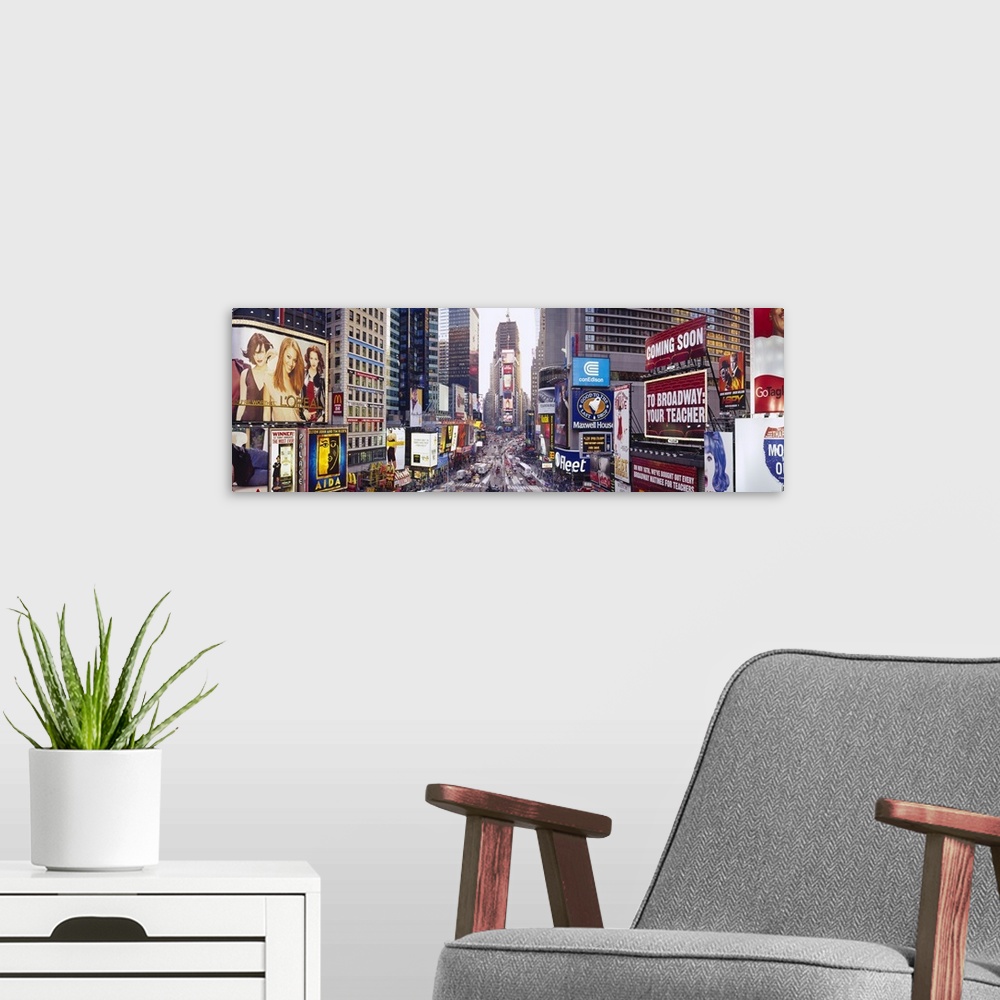 A modern room featuring Panoramic photograph of a long angle street view of the "Big Apple."  The busy street is filled w...
