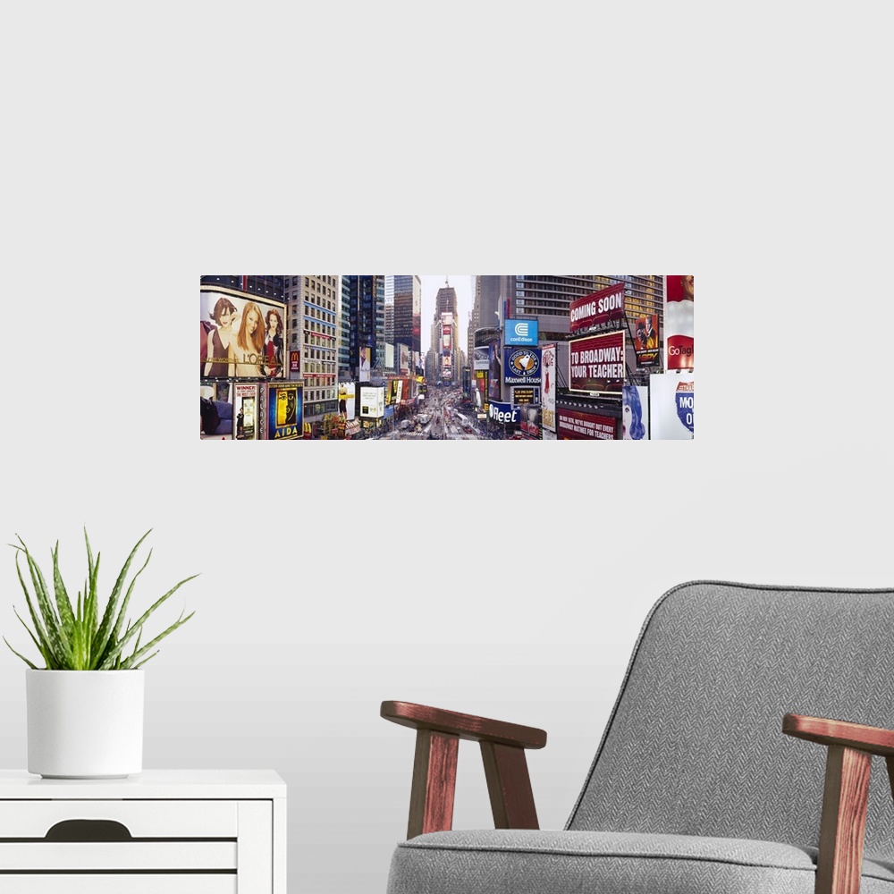 A modern room featuring Panoramic photograph of a long angle street view of the "Big Apple."  The busy street is filled w...