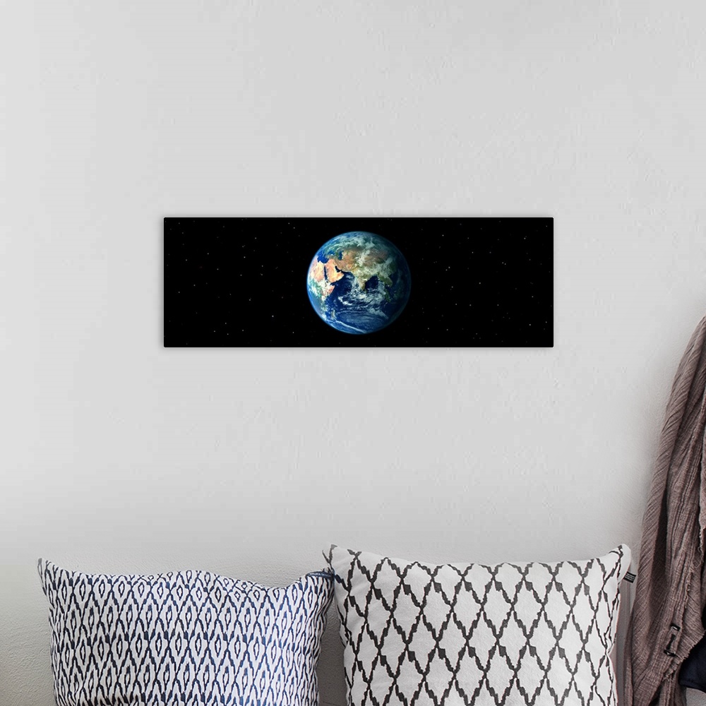 A bohemian room featuring Earth in Space showing Asia and Africa (Photo Illustration)