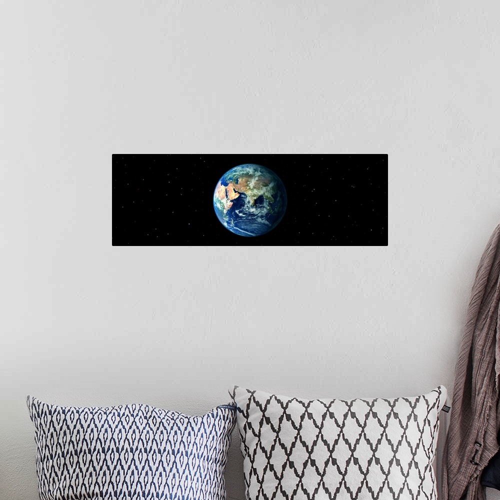 A bohemian room featuring Earth in Space showing Asia and Africa (Photo Illustration)