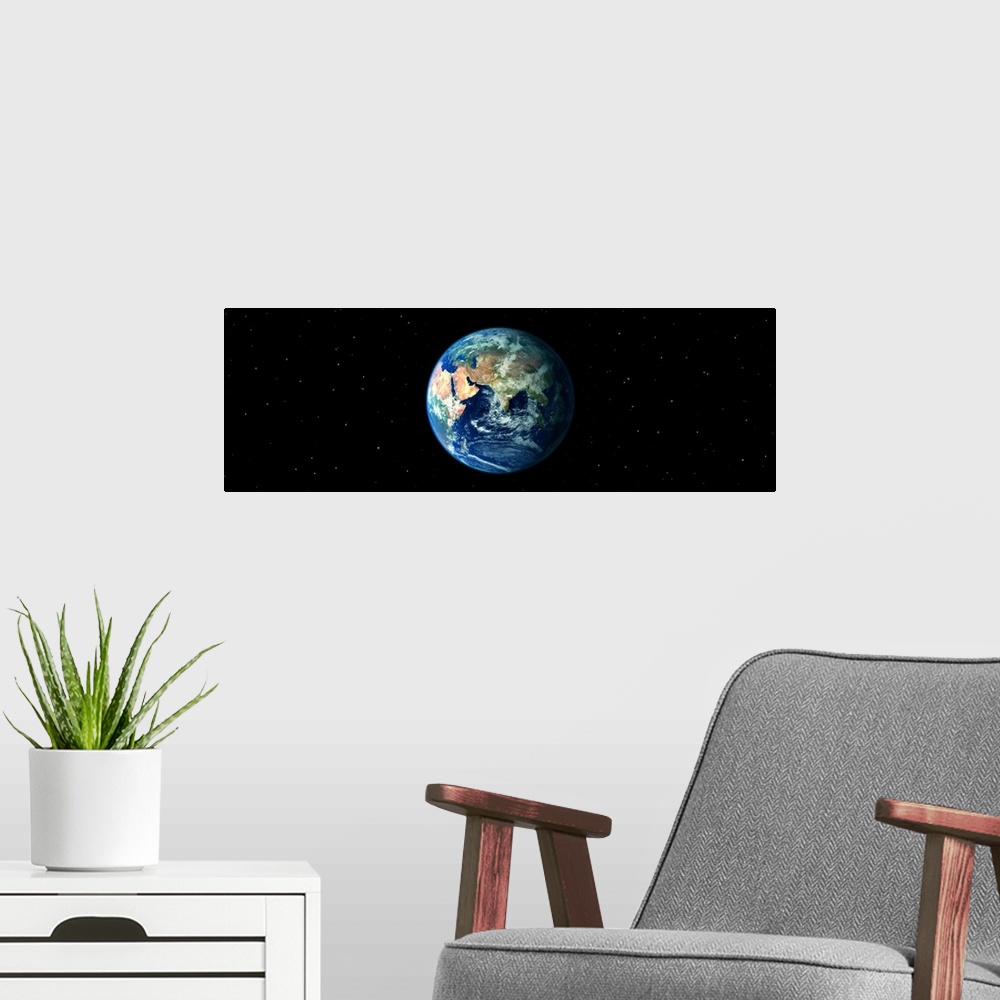 A modern room featuring Earth in Space showing Asia and Africa (Photo Illustration)