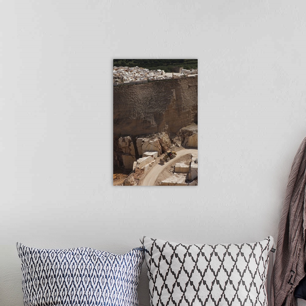 A bohemian room featuring Earth mover at a marble quarry, Orosei, Golfo di Orosei, Sardinia, Italy