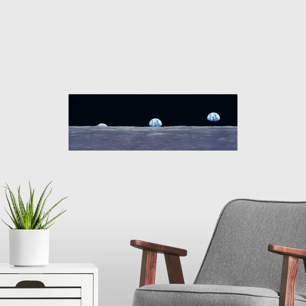 A modern room featuring Composite image from the surface of the moon of three photos of the planet Earth rising over the ...