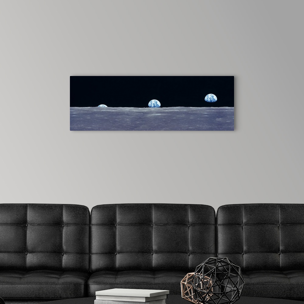 A modern room featuring Composite image from the surface of the moon of three photos of the planet Earth rising over the ...