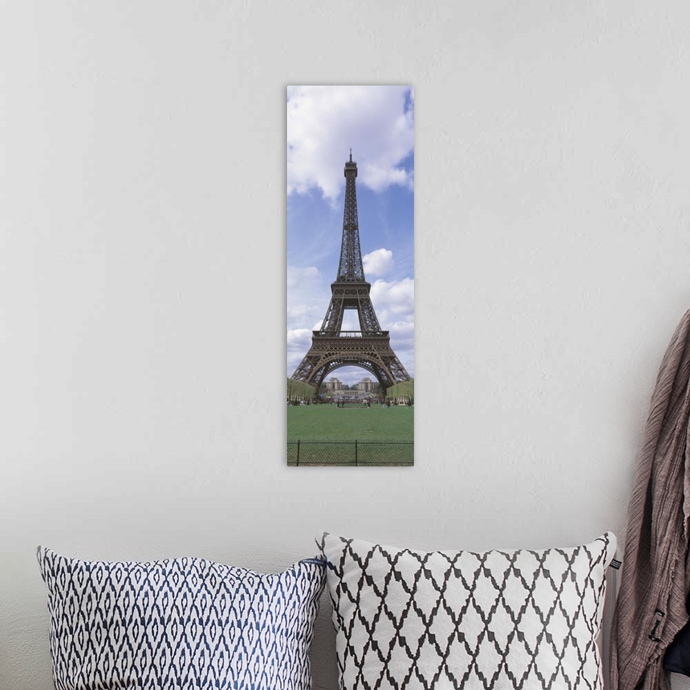 A bohemian room featuring This wall art is a narrow vertical photograph of this famous landmark that excludes the rest of t...