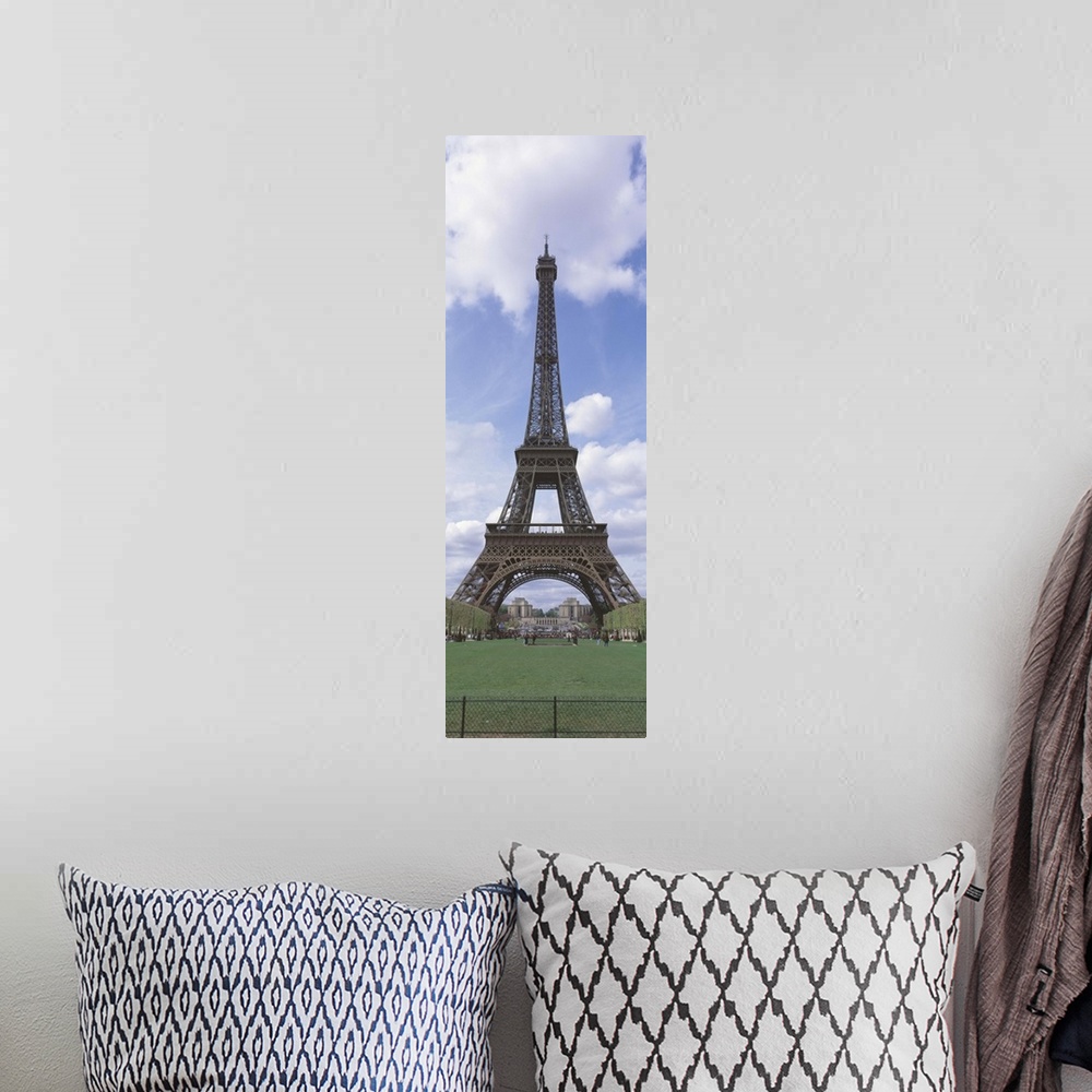 A bohemian room featuring This wall art is a narrow vertical photograph of this famous landmark that excludes the rest of t...