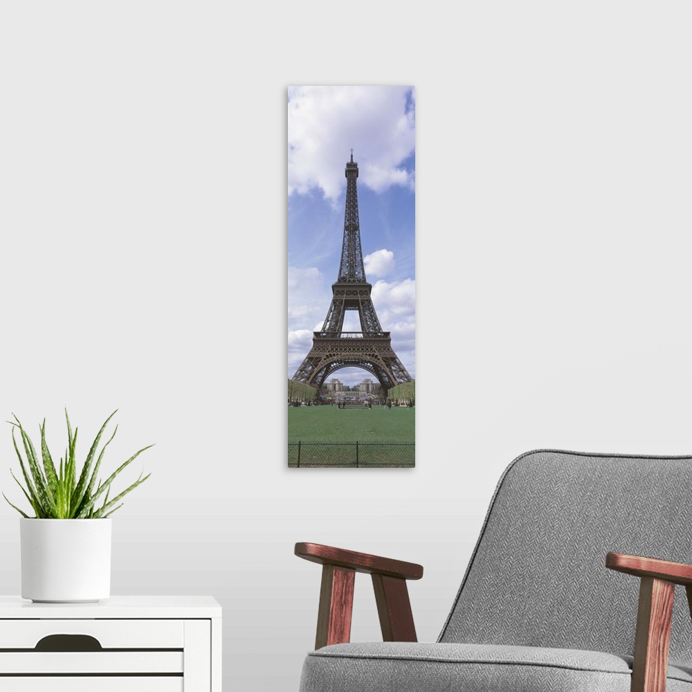 A modern room featuring This wall art is a narrow vertical photograph of this famous landmark that excludes the rest of t...