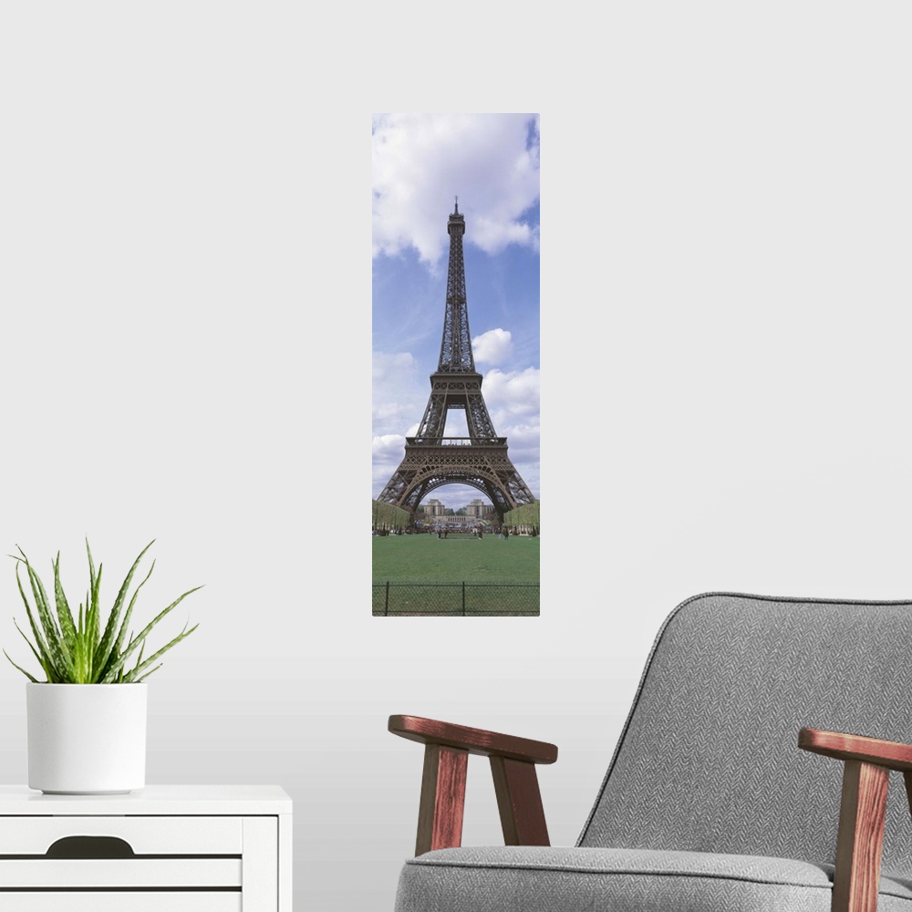 A modern room featuring This wall art is a narrow vertical photograph of this famous landmark that excludes the rest of t...