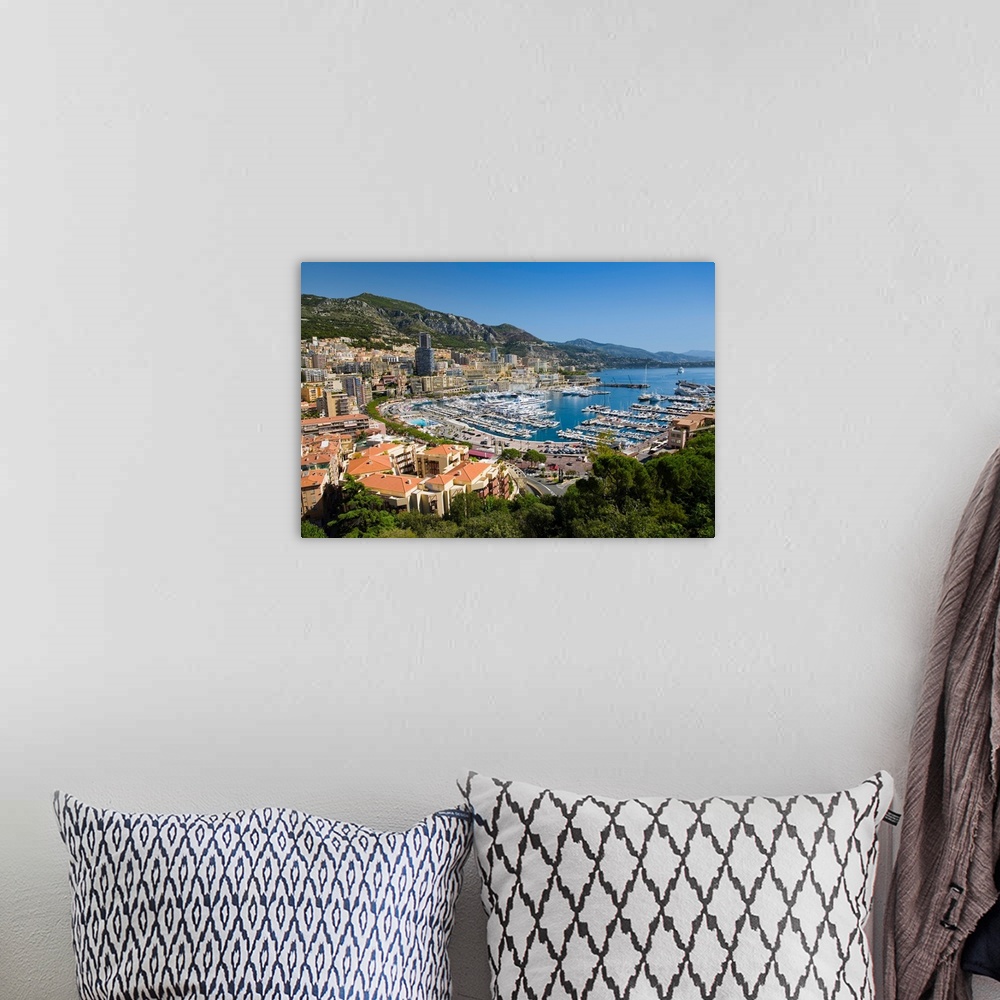 A bohemian room featuring Elevated view of Monte-Carlo and harbor in the Principality of Monaco, Western Europe on the Medi...
