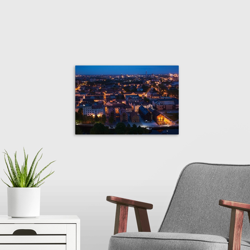 A modern room featuring Elevated view of Old Town at dusk, Klaipeda, Lithuania