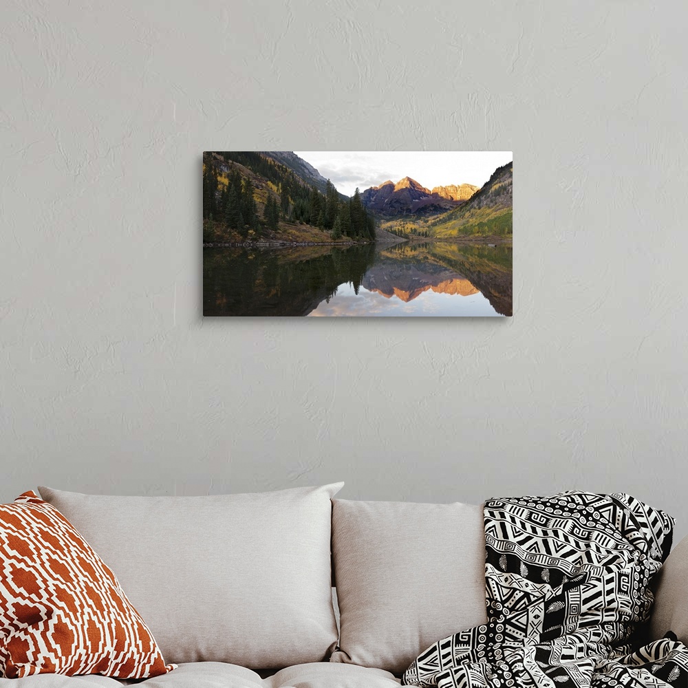 A bohemian room featuring Elk Mountains reflected in Maroon Bells Lake, Pitkin County, Colorado, USA.