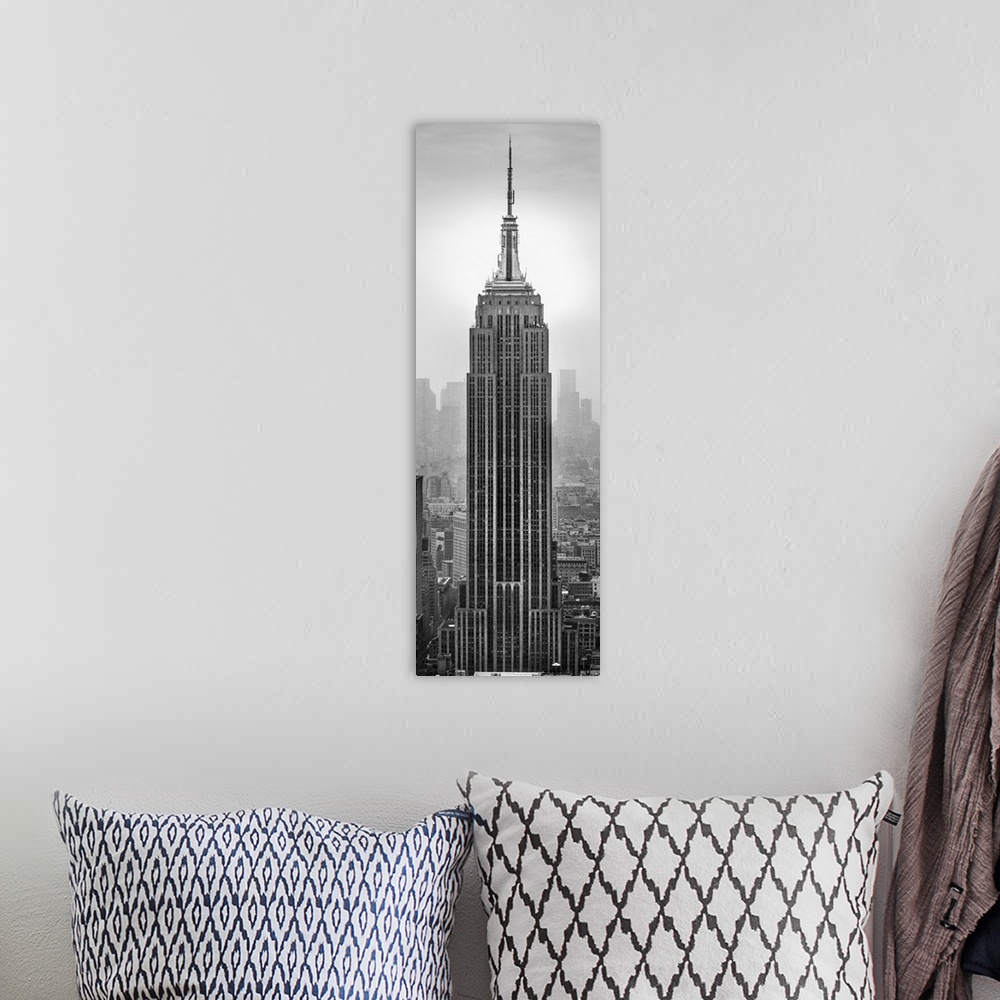 A bohemian room featuring Empire State Building in a city, Manhattan, New York City, New York State, USA.