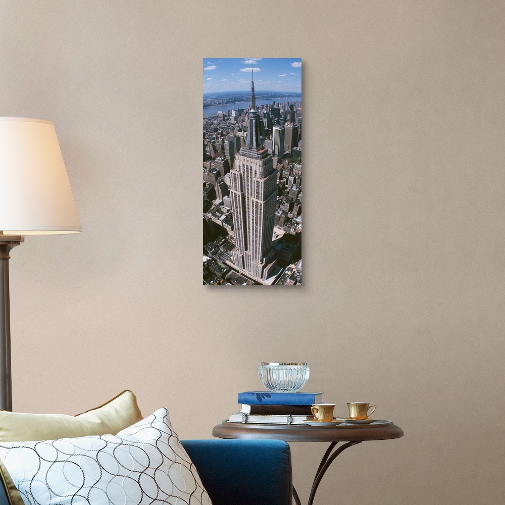 A traditional room featuring Panoramic photograph taken from an aerial view focuses on a landmark skyscraper found within Manh...