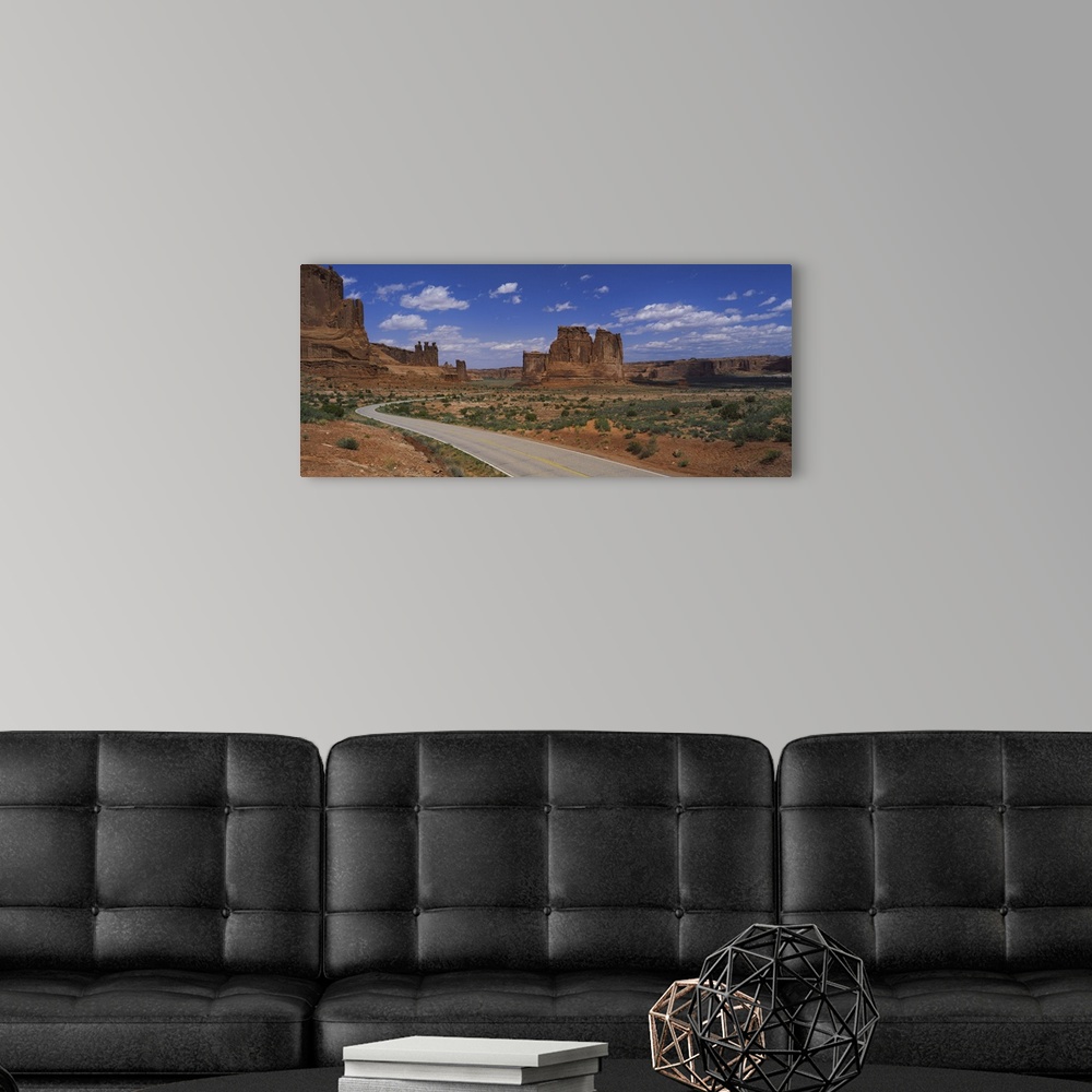 A modern room featuring Empty road running through a national park, Arches National Park, Utah
