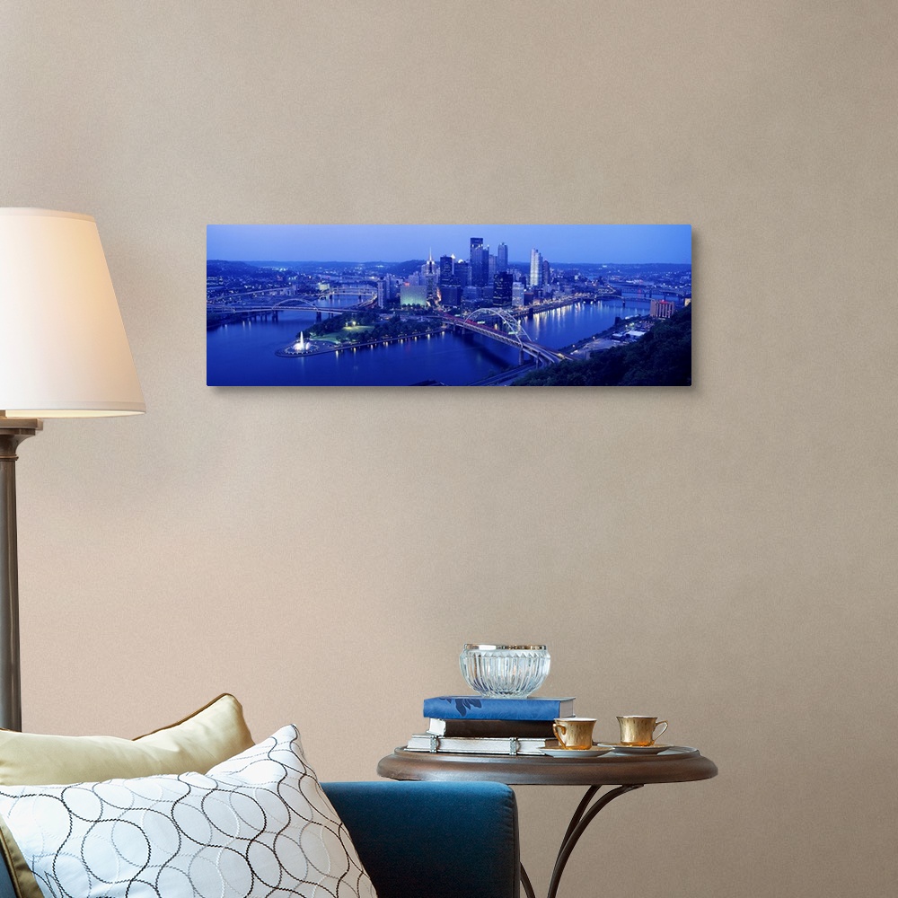 A traditional room featuring Panoramic evening view of Pittsburgh, PA with West End Bridge, and Allegheny, Monongahela and Ohi...