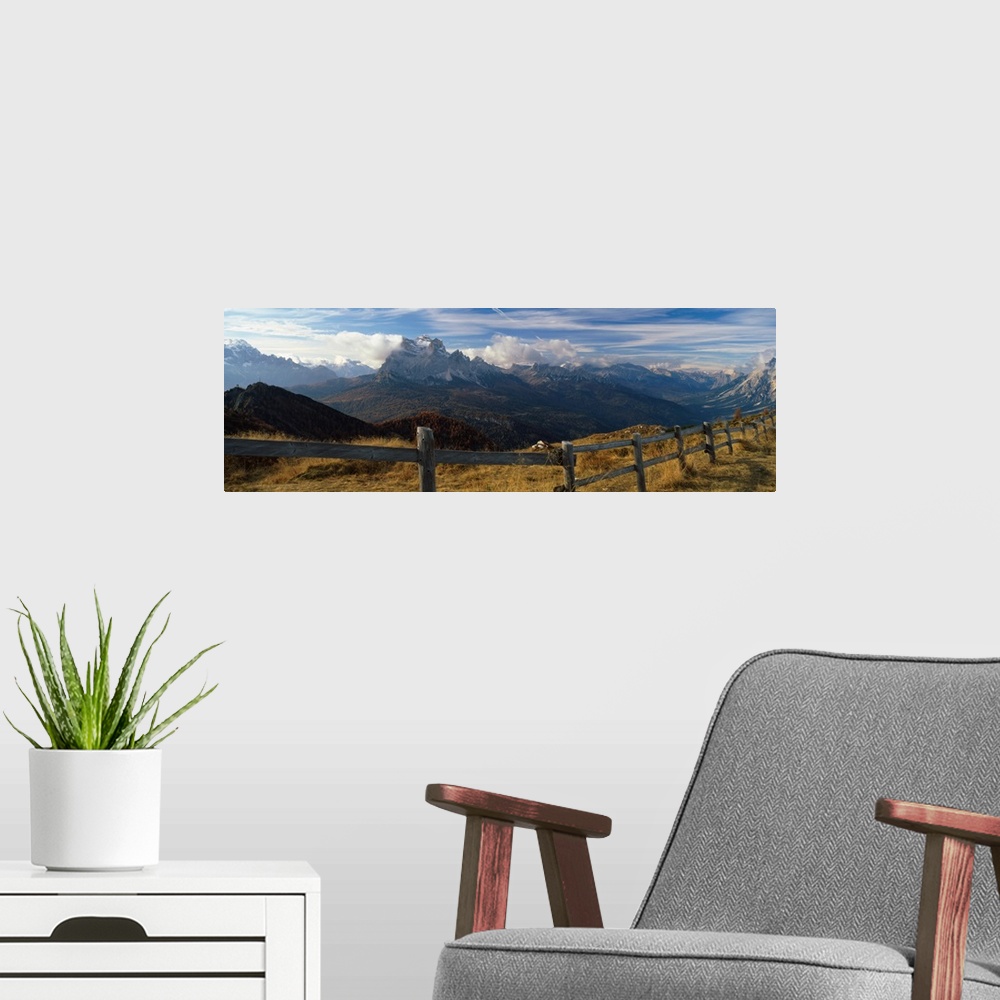 A modern room featuring Fence with a mountain range in the background, Mt Rite, Dolomites, Cadore, Province of Belluno, V...