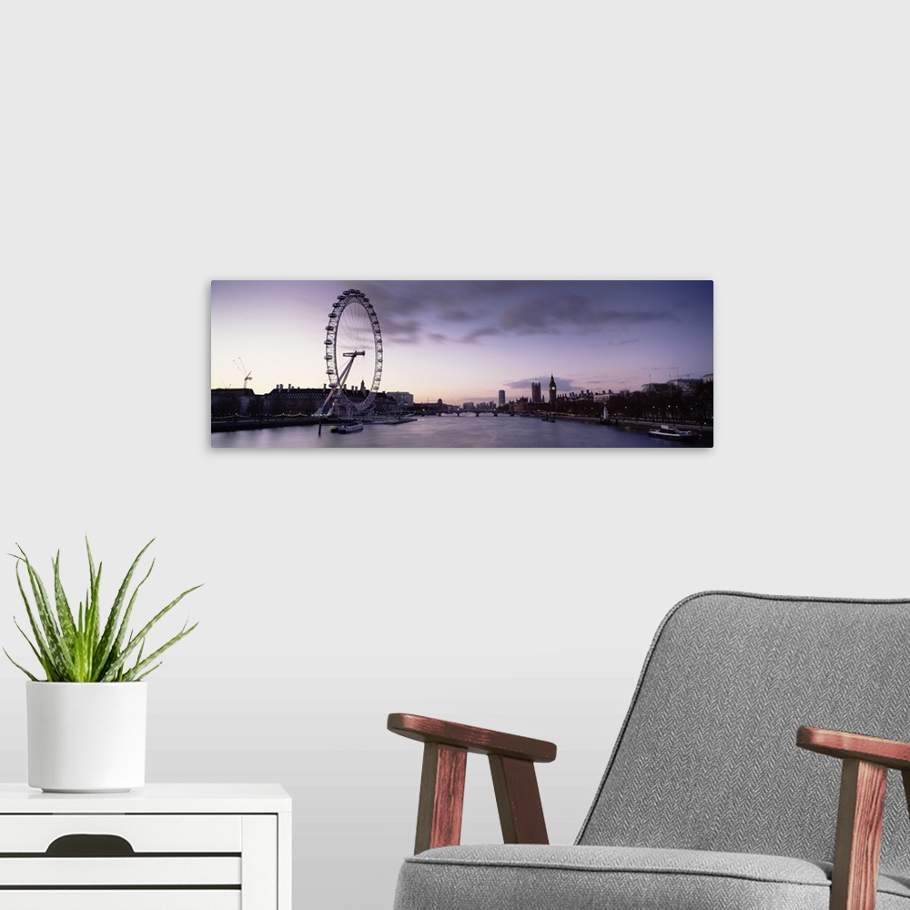 A modern room featuring Ferris wheel at the riverside with a bridge in the background Westminster bridge Thames River Big...