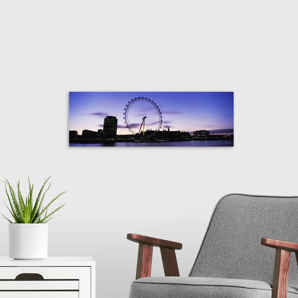 A modern room featuring Ferris wheel in a city, Millennium Wheel, Thames River, London, England