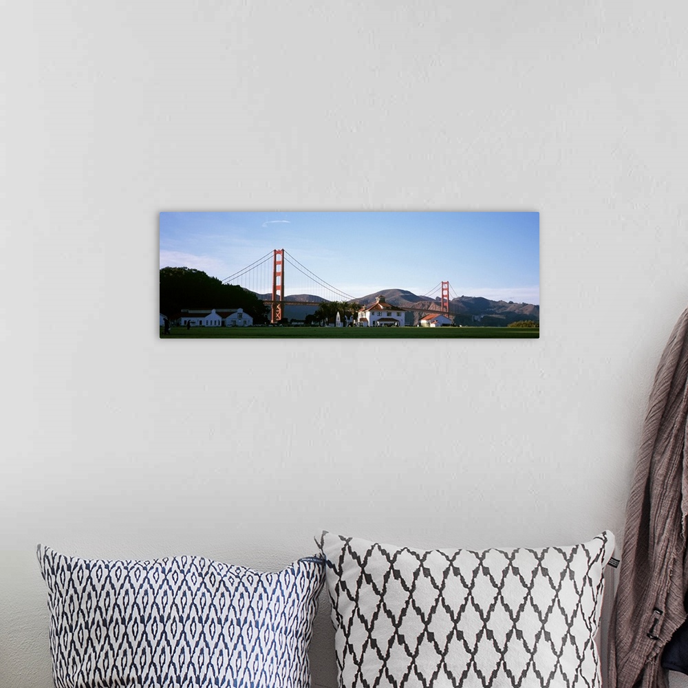 A bohemian room featuring Field with suspension bridge and mountains, Crissy Field, Golden Gate Bridge, San Francisco, Cali...