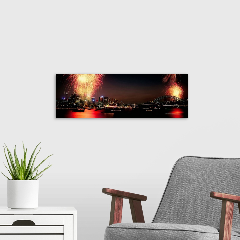 A modern room featuring Firework display at New year's eve in a city, Sydney, New South Wales, Australia