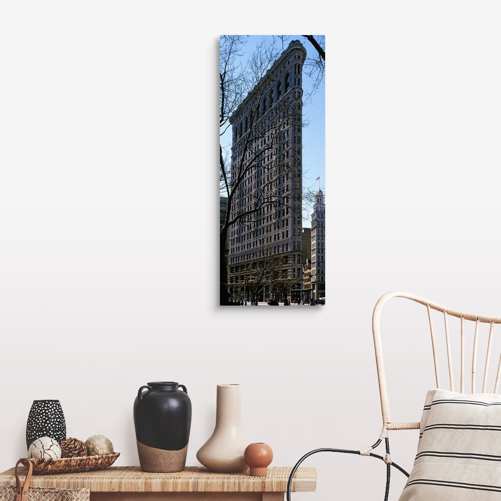 A farmhouse room featuring Tall canvas photo of a famous thin building in NYC.