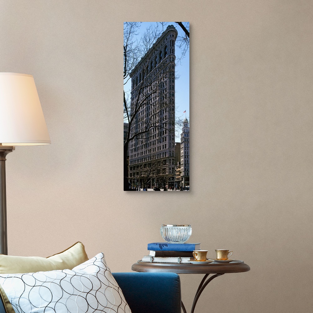 A traditional room featuring Tall canvas photo of a famous thin building in NYC.