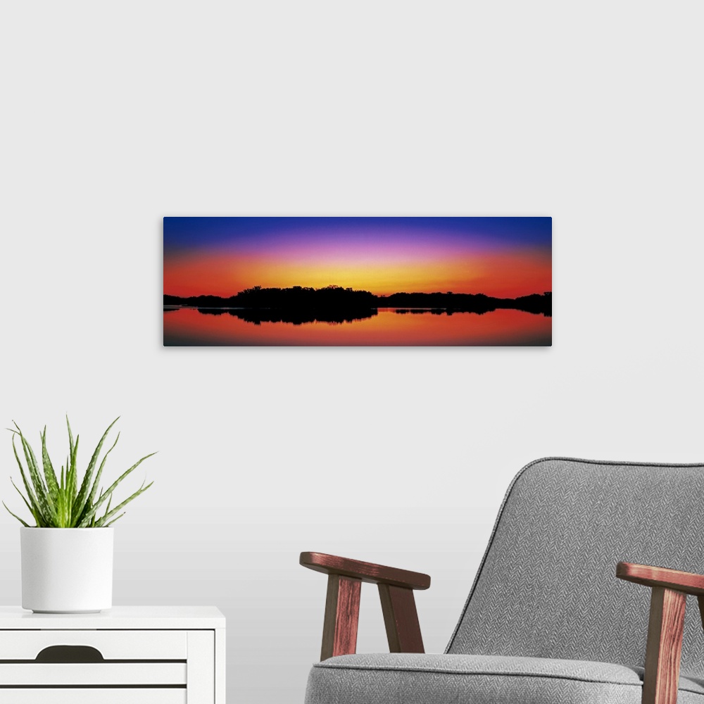 A modern room featuring Florida, Everglades National Park, Paroutis Pond, Panoramic view of dusk over water